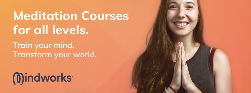 An image of a beautiful girl with hands in prayer mudra, thinking about taking a meditation course to train her mind