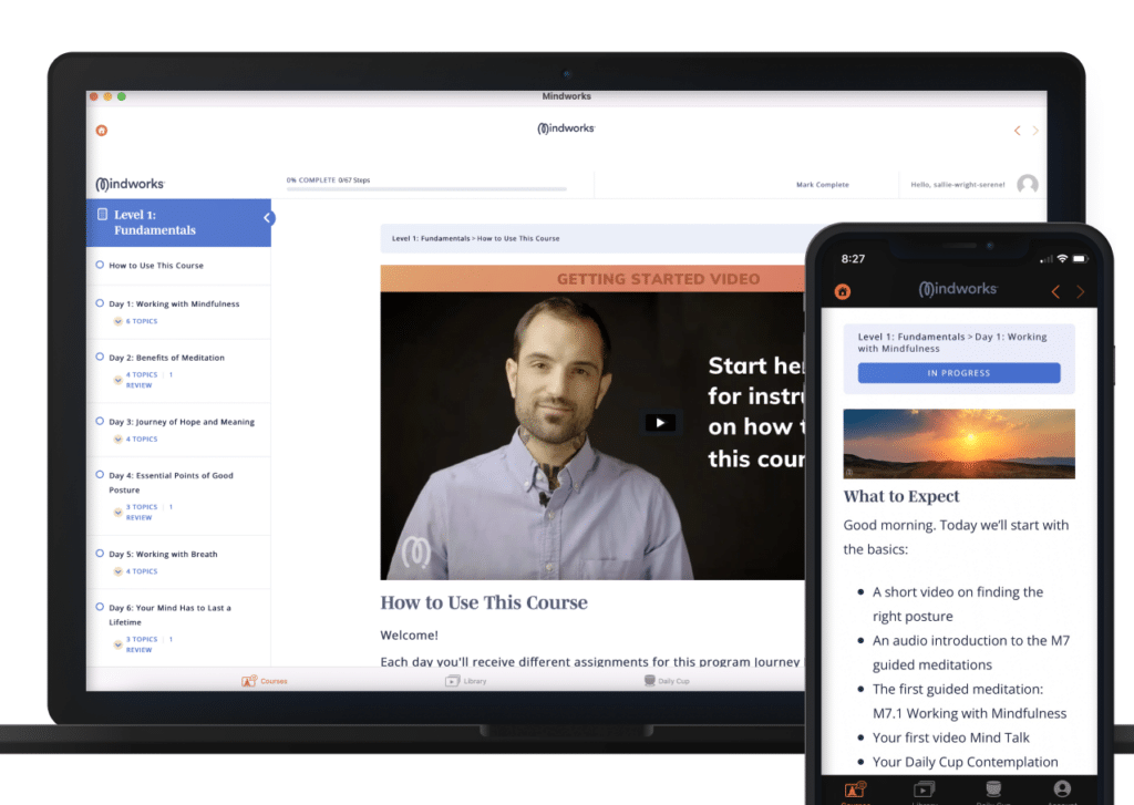 An image of a Laptop and and iPhone with Mindworks Members site and app open