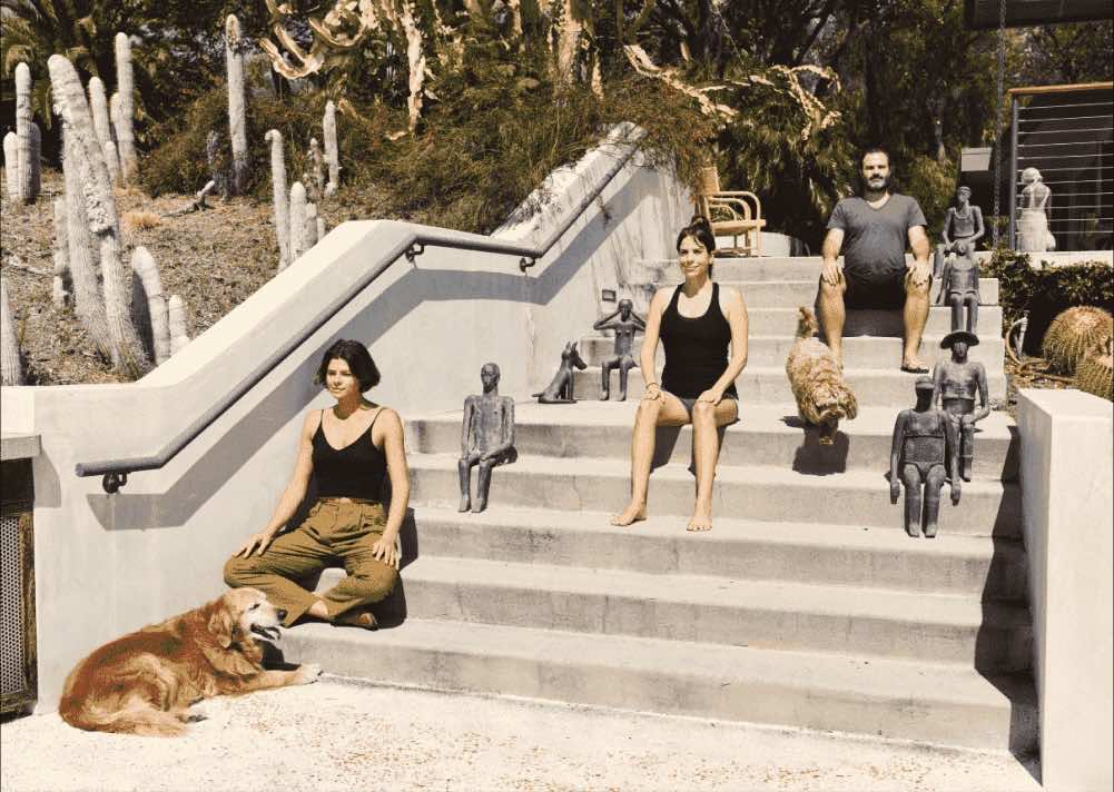 3 Mindworks members meditating on steps